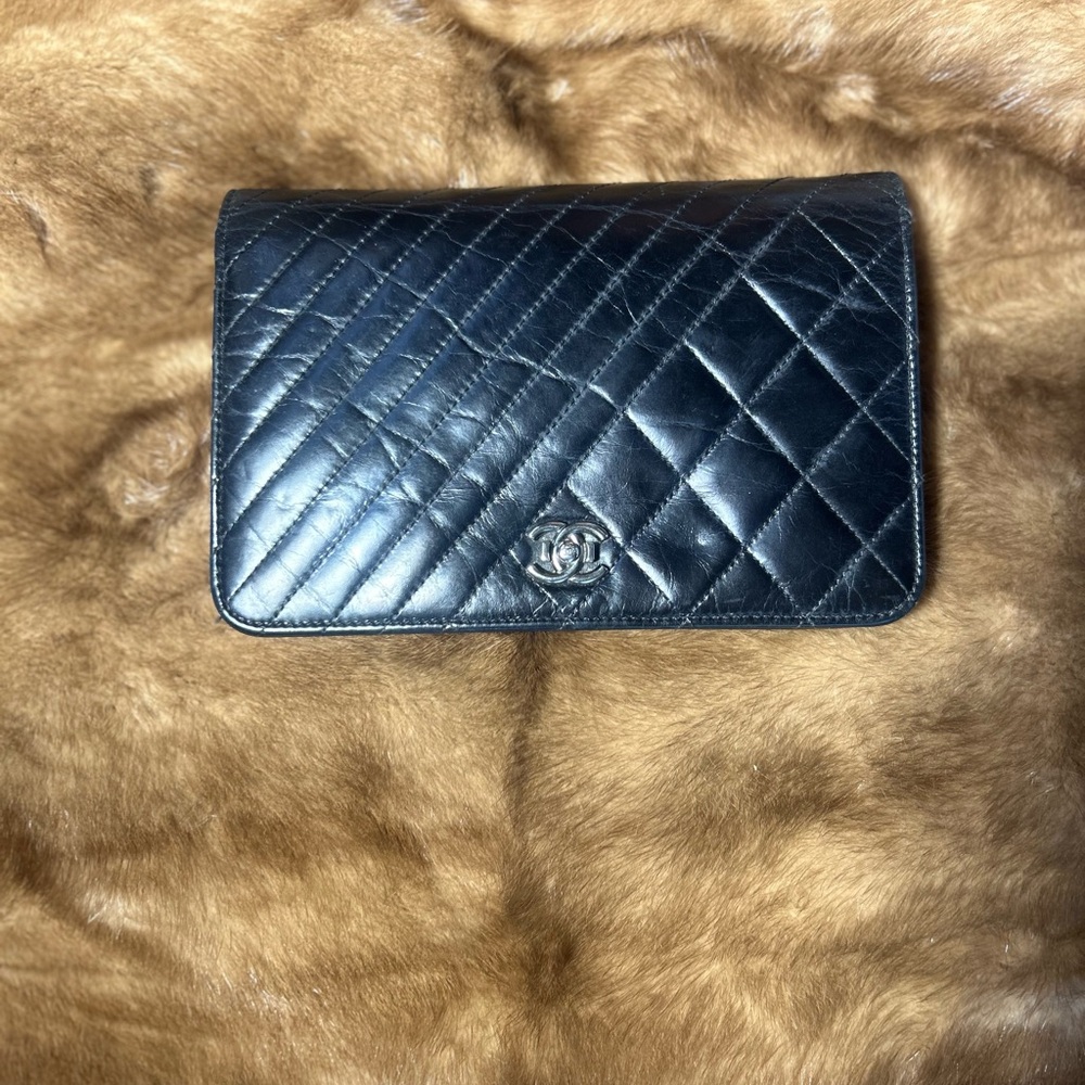 Authentic CHANEL Black Quilted Clutch with Iconic Logo